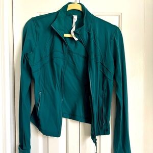 Lululemon cropped Define Jacket in Storm Teal. Worn once. Size 10. Runs small.